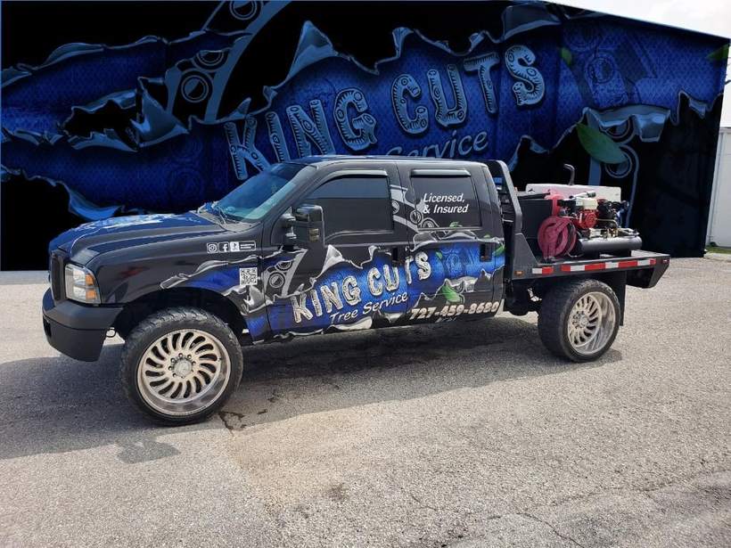 The King Cuts truck with company wrap and equipment loaded